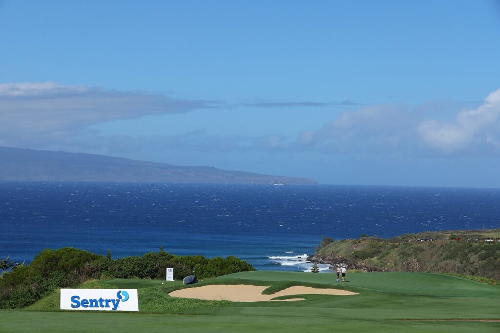 KAPALUA, HAWAII - JANUARY 02:  A general view of the 11th green as Tom Kim of South Korea plays the hole during a practice round prior to The Sentry at Plantation Course at Kapalua Golf Club on January 02, 2024 in Kapalua, Hawaii. (Photo by Kevin C. Cox/Getty Images)