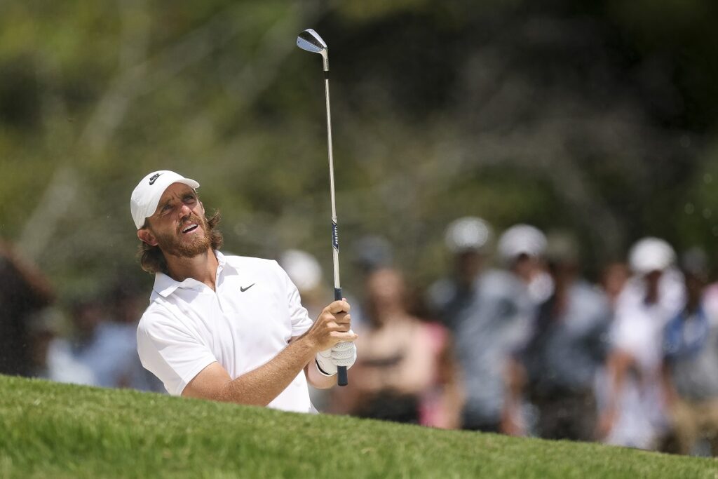 MEMPHIS, TENNESSEE - AUGUST 10: Tommy Fleetwood of England watches an approach shot on the first hole during the final round of the FedEx St. Jude Championship 2025 at TPC Southwind on August 10, 2025 in Memphis, Tennessee. (Photo by Andy Lyons/Getty Images)