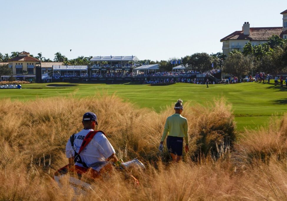 NAPLES, FLORIDA - NOVEMBER 19: Nelly Korda of the United States and caddie Jason McDede walk up the 18th fairway during the final round of the CME Group Tour Championship at Tiburon Golf Club on November 19, 2023 in Naples, Florida. (Photo by Douglas P. DeFelice/Getty Images)