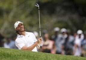 MEMPHIS, TENNESSEE - AUGUST 10: Tommy Fleetwood of England watches an approach shot on the first hole during the final round of the FedEx St. Jude Championship 2025 at TPC Southwind on August 10, 2025 in Memphis, Tennessee. (Photo by Andy Lyons/Getty Images)